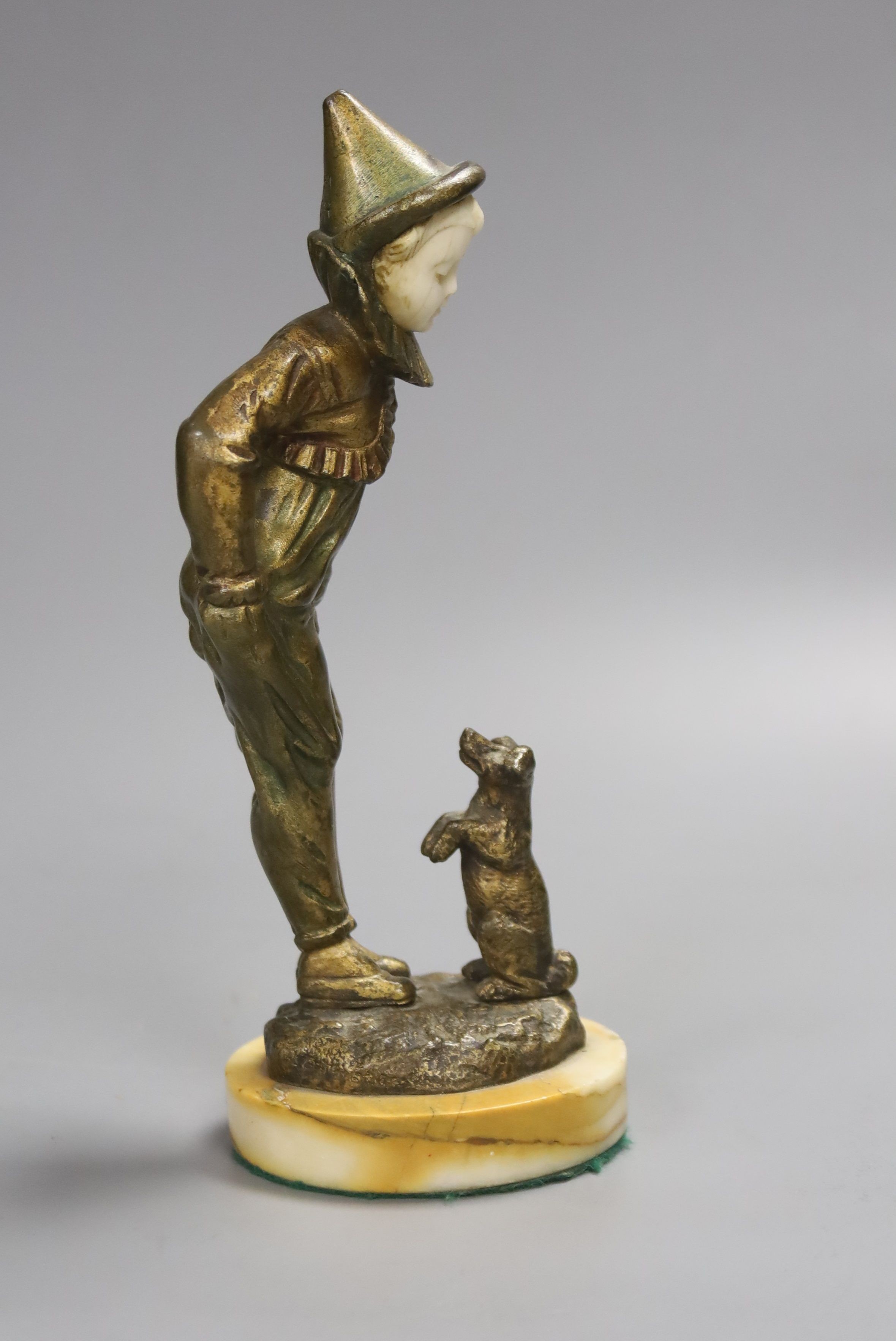 Georges Omerth. An Art Deco gilt bronze and ivory of a pierrot and dog, height 20cm